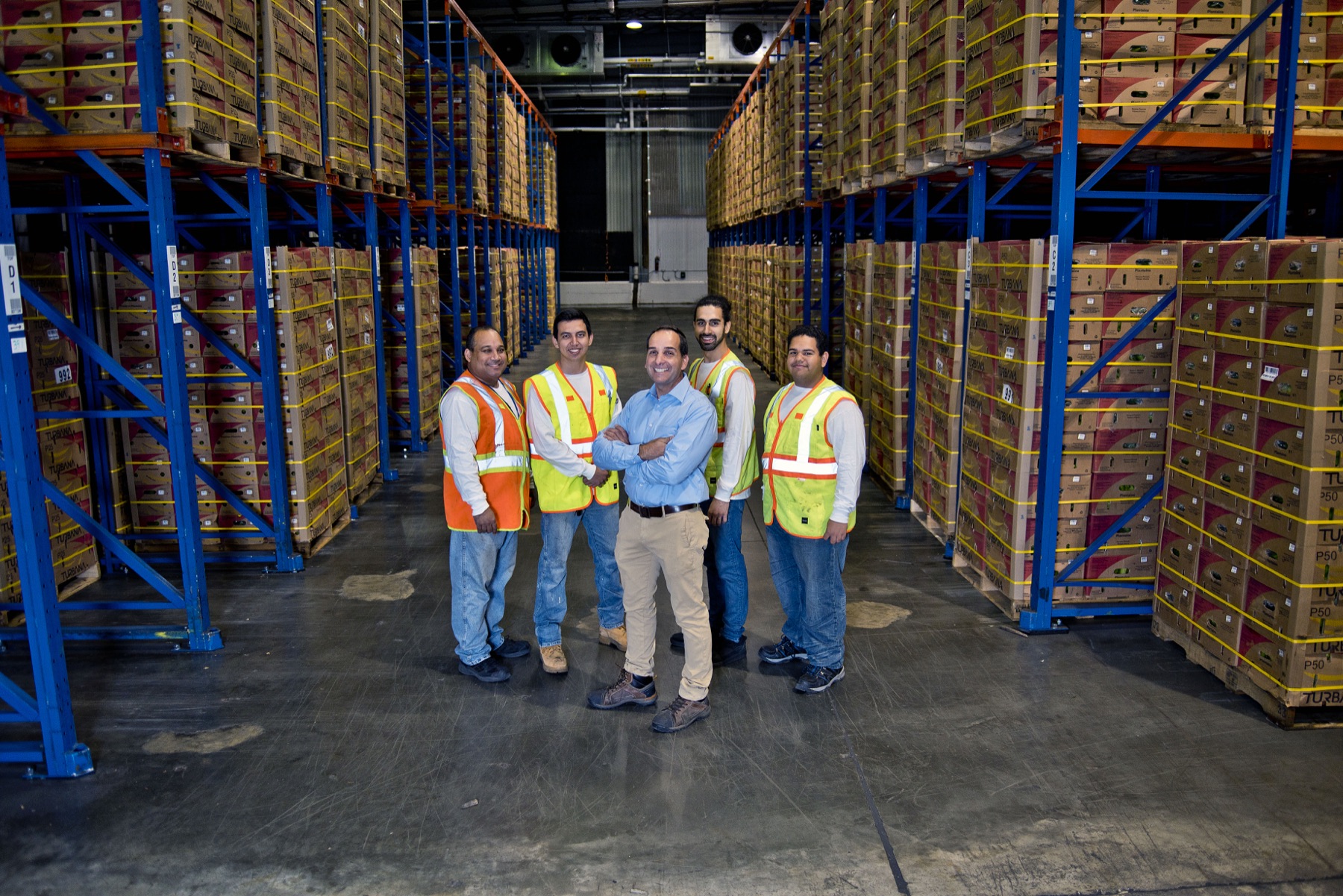 Colusa produce services team inside a warehouse